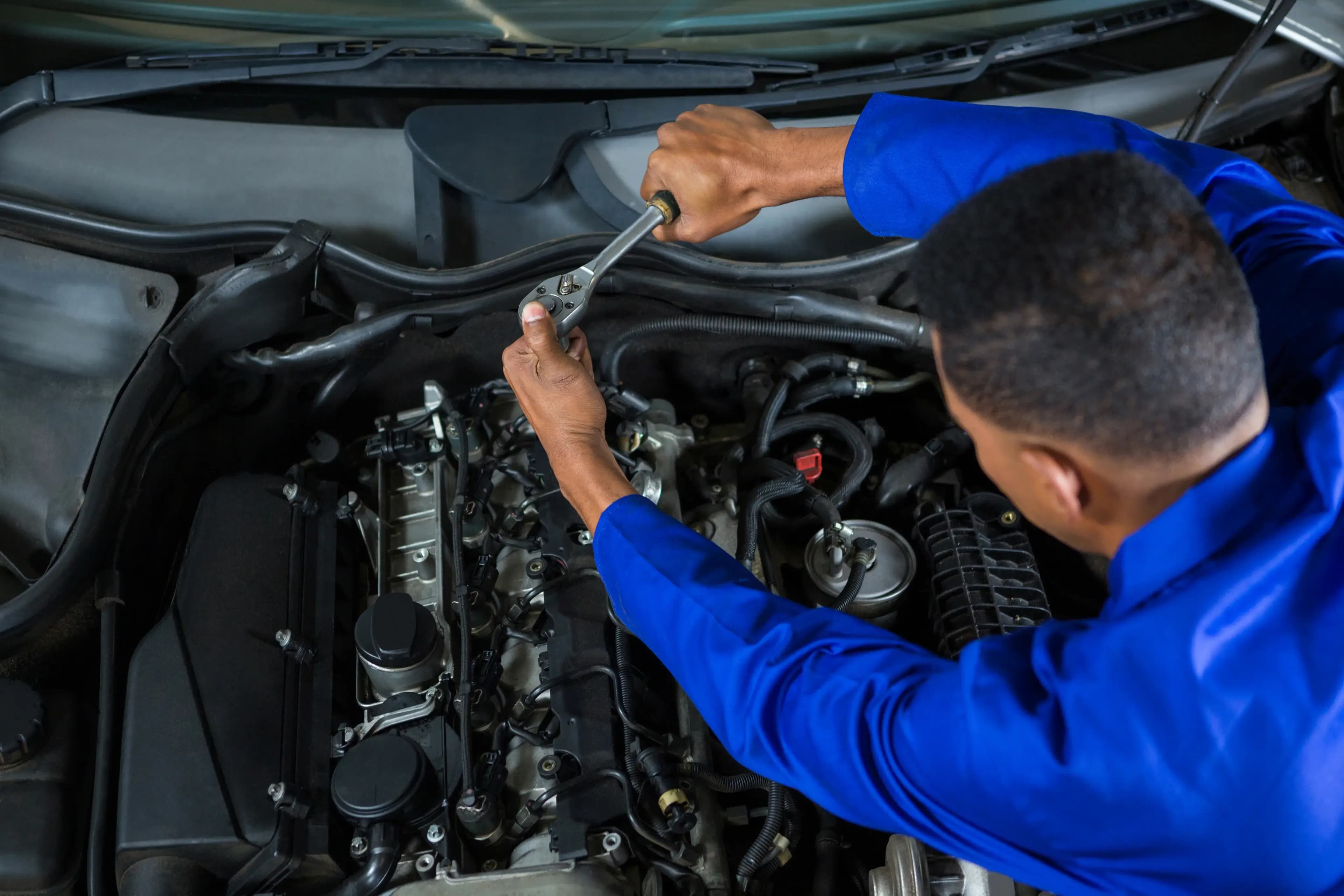 Mechanic servicing a vehicle
